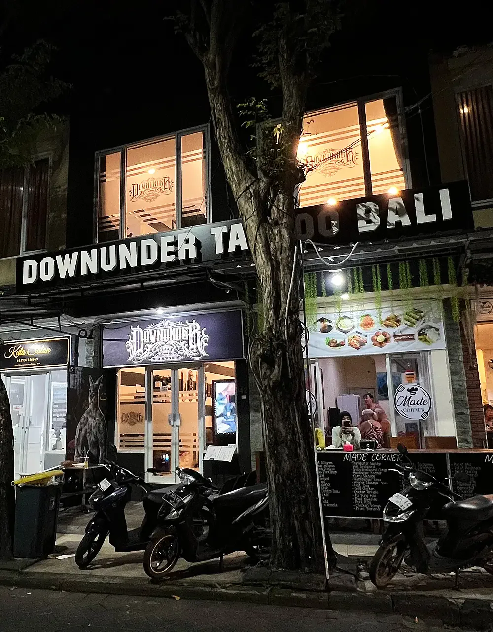 Downunder Tattoo Bali shop front at night on Jl. Bakung Sari, Kuta